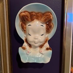 Cute royal wall pocket lady head vase.